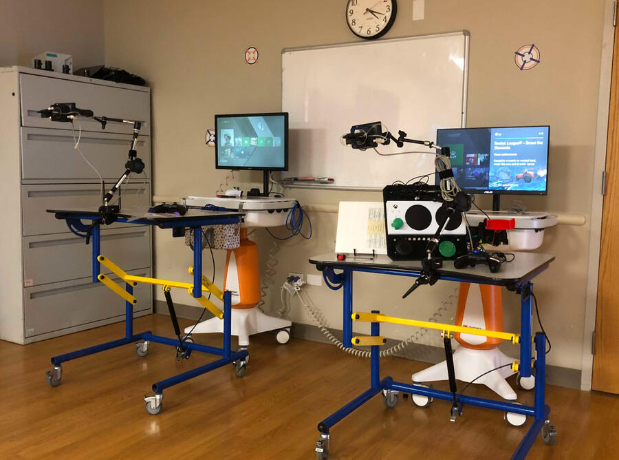 mike pictured in hospital bed with a neck brace after his accident